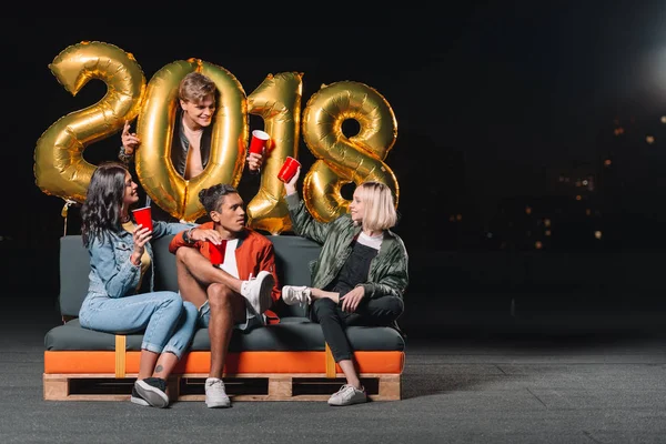 Friends celebrating new year — Stock Photo