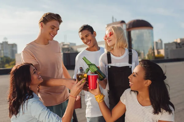 Friends having party on roof — Stock Photo