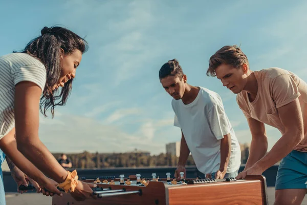 Friends playing table football — Stock Photo