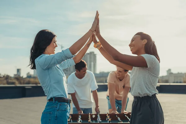 Friends playing table football — Stock Photo