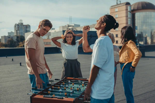 Friends playing table football — Stock Photo