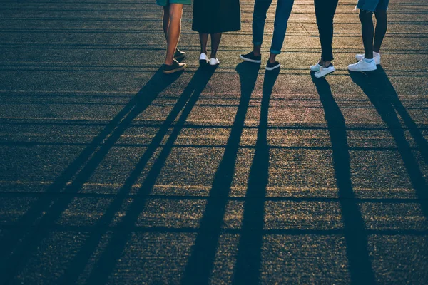 Group of people on sunset — Stock Photo