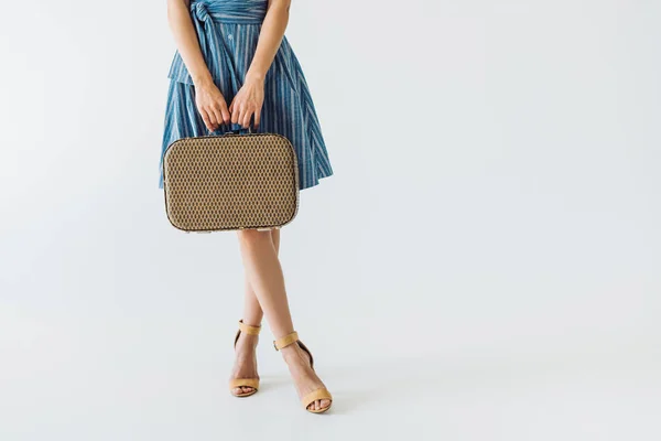 Woman holding suitcase — Stock Photo