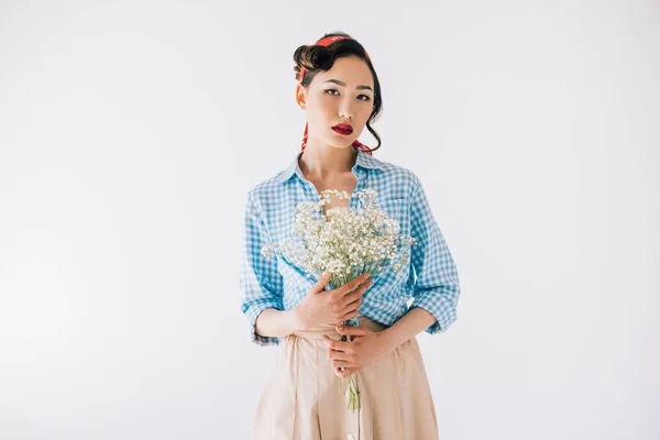 Sensual asian woman with bouquet of flowers — Stock Photo