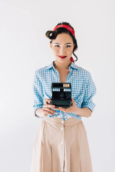 Asian woman with photo camera — Stock Photo