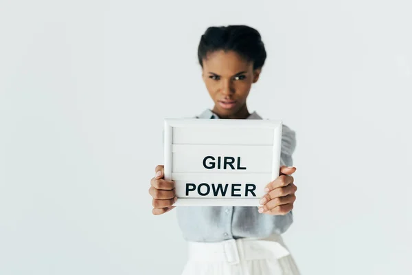 African american woman with girl power board — Stock Photo