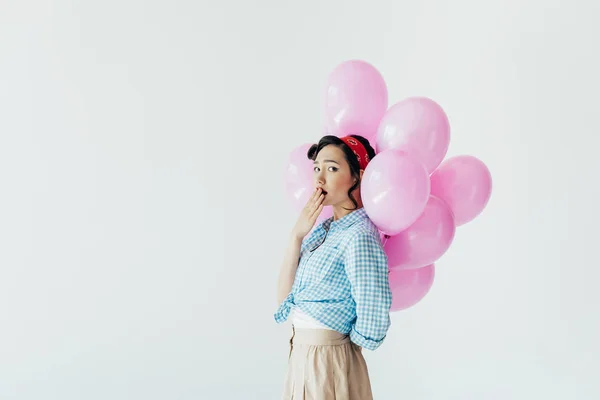 Азіатська жінка тримає повітряні кулі — стокове фото