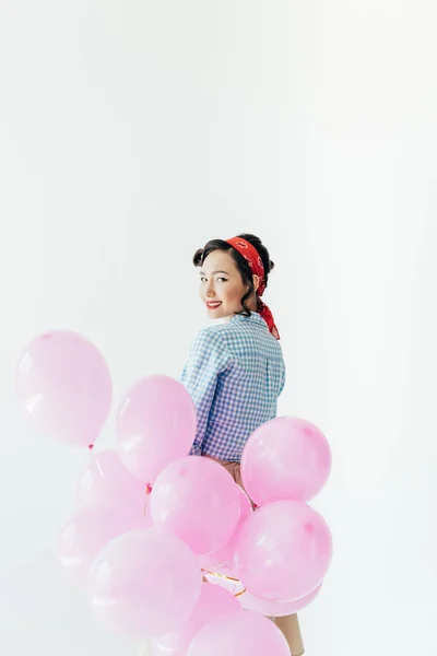 Femme asiatique avec des ballons — Photo de stock