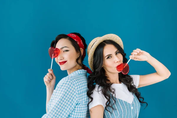 Multicultural women with lollipops — Stock Photo