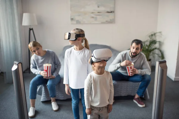 Kids in vr headsets at home — Stock Photo