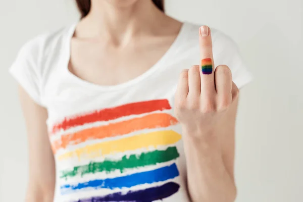 Woman showing middle finger — Stock Photo