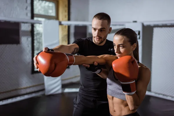 Trainer and female boxer — Stock Photo