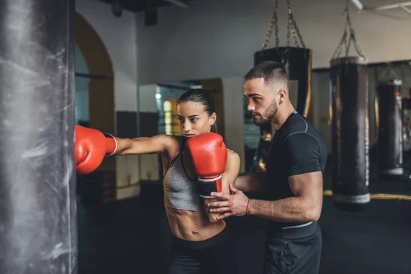 Trainer and female boxer — Stock Photo