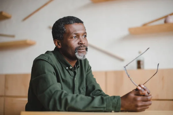 Thoughtful mature man — Stock Photo