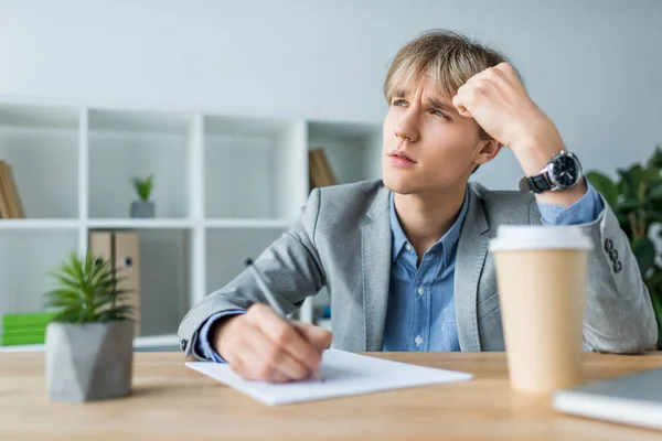 Thoughtful businessman — Stock Photo