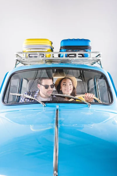Travelers driving car — Stock Photo
