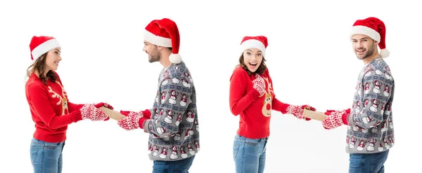 Hombre y mujer compartiendo regalos de Navidad - foto de stock