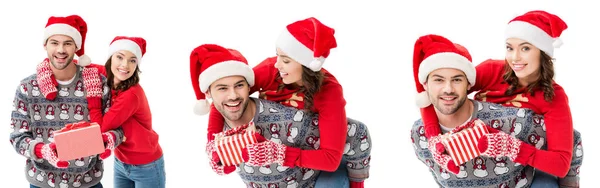 Jeune couple dans chapeaux de Père Noël — Photo de stock