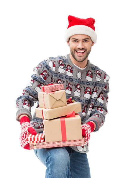 Homme tenant pile de cadeaux de Noël — Photo de stock