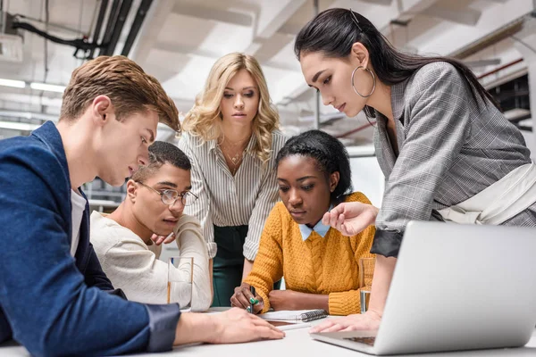 Concentrated business partners working together at conference hall — Stock Photo