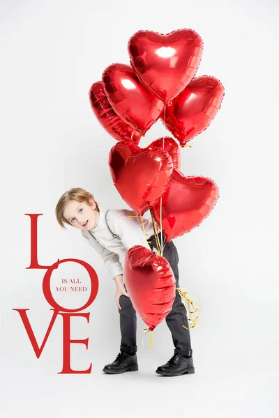 Niño con globos de aire - foto de stock