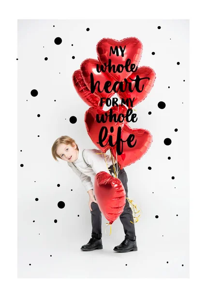 Boy with air balloons — Stock Photo