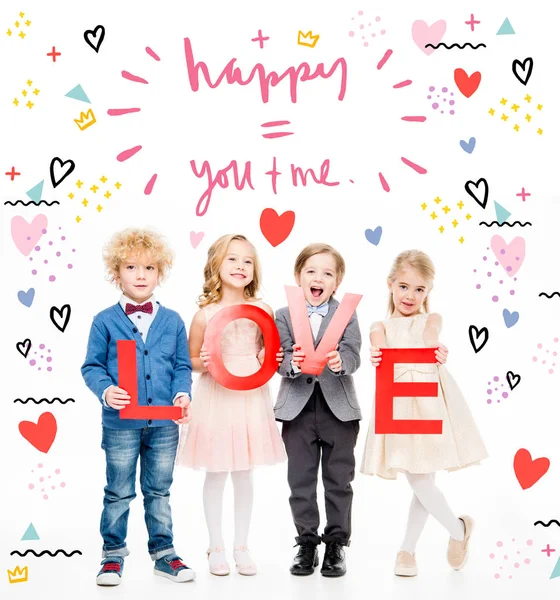 Kids holding word love — Stock Photo