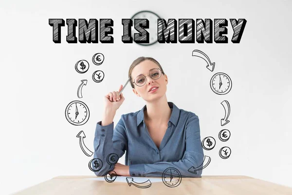 Thoughtful businesswoman sitting at table and holding pencil in hand, with time is money inscription and hand drawn business circuit — Stock Photo