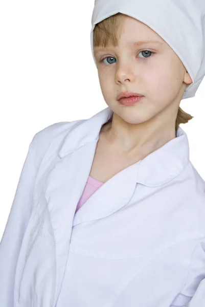 Criança em um manto médico branco . — Fotografia de Stock