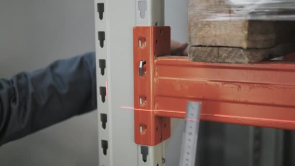 Males Hands With Precision Measuring Tool. Engineer Makes Measurement of The Beam At The Storage, Close Up Shot — Stock Video