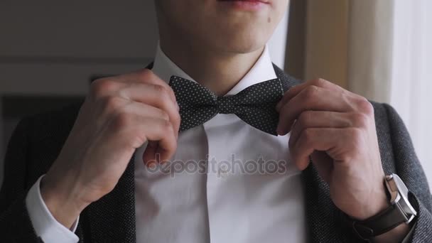 Fees Groom, Wedding Preparation, Man Correcting His Bowtie — Stock Video