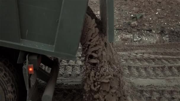 Heavy Duty Dump Truck Dumping Soil, Road Works — Stock Video