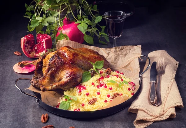 Duck with millet and pomegranate — Stock Photo, Image