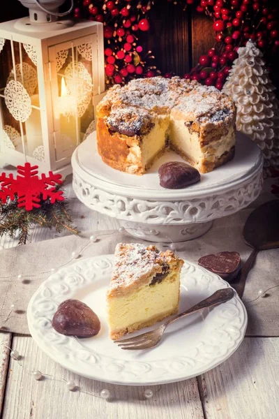 Christmas Cheesecake on white plate — Stock Photo, Image