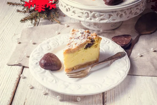 Christmas Cheesecake on white plate — Stock Photo, Image