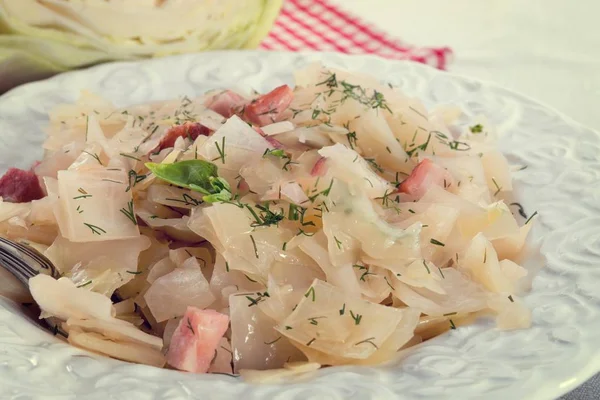 Fresh cabbage with bacon — Stock Photo, Image