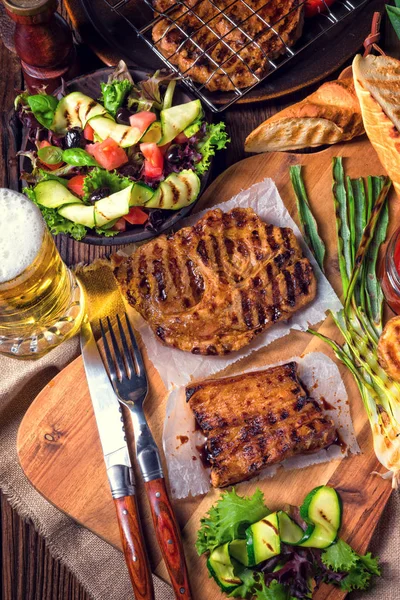Grilled meat and vegetables Stock Photo