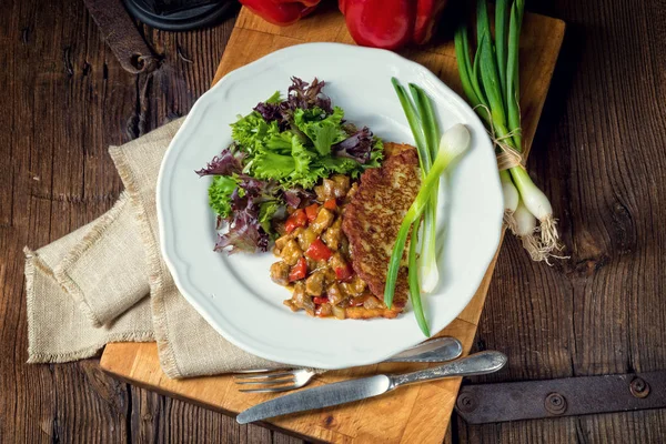 Goulash with potato pancakes — Stock Image Goulash with potato pancakes Stock Picture