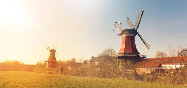 windmills and sunset sky