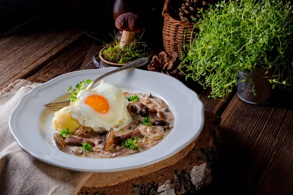 Mushrooms with potato and poached egg on plate — Stock Photo, Image