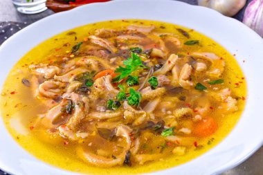 Tasty Polish Flaczki, delicious Tripe soup (traditional Polish meat stew) clipart