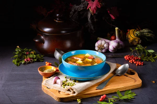 Polish pea soup (grochowka) with smoked bacon and sausage — Stock Image Polish pea soup (grochowka) with smoked bacon and sausage Royalty Free Stock Images