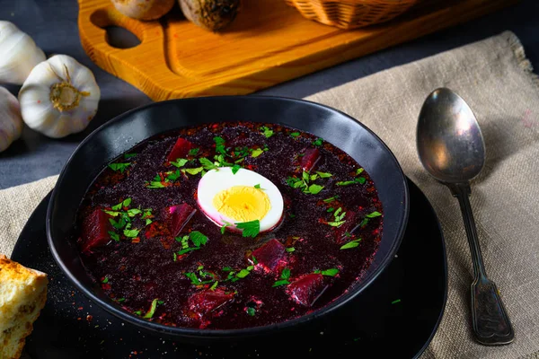 Delicious beetroot borscht with egg — Stock Image Delicious beetroot borscht with egg Stock Image