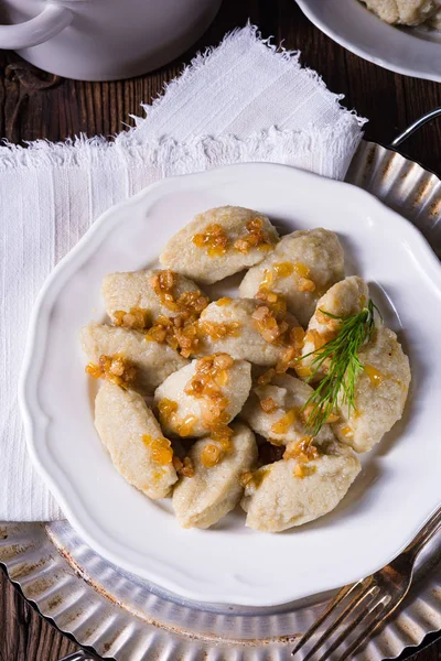 Szare kluski, Polish dumplings with sauerkraut — Stock Photo, Image