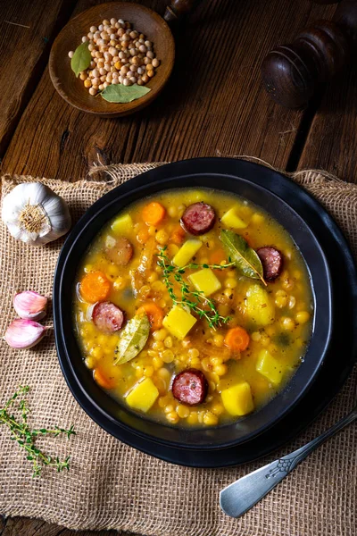 Rustic pea soup with bacon and sausages — Stock Image Rustic Pea Soup Bacon Sausages Royalty Free Stock Images