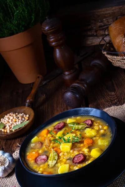 Rustic pea soup with bacon and sausages — Stock Image Rustic Pea Soup Bacon Sausages Stock Picture