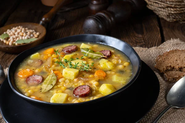 Rustic pea soup with bacon and sausages — Stock Image Rustic Pea Soup Bacon Sausages Stock Image