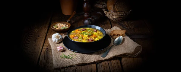 Rustic pea soup with bacon and sausages — Stock Image Rustic Pea Soup Bacon Sausages Stock Photo