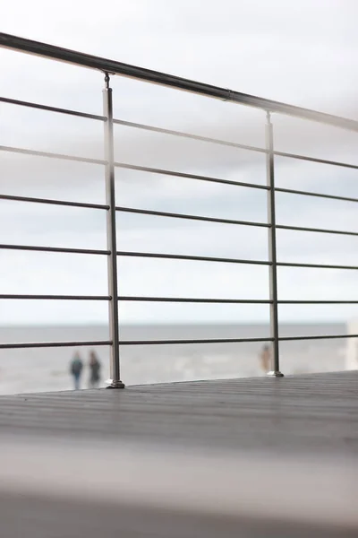 Deck with railing on the beach — Stock Photo, Image