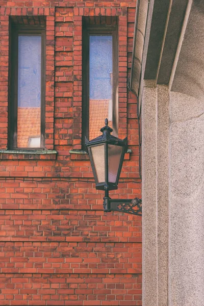 Street lamp on the red wall — Stock Photo, Image